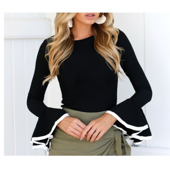 white blouse with flowy sleeves